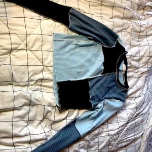 Patterned blue and black long sleeve top